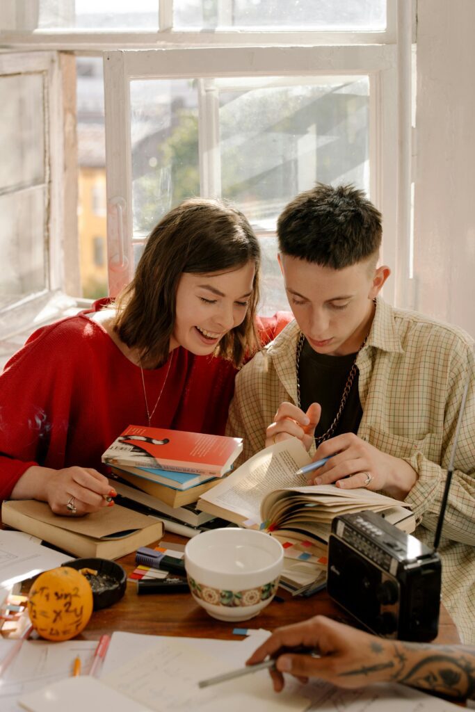 Couple reading Attachment Style books.
