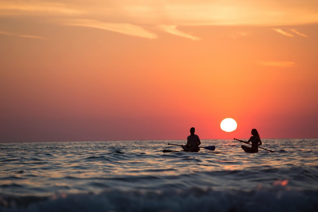 A couple at sea, canoeing not taking emotional distance personally showing how to be with someone with a disorganized attachment style,